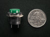 Angled shot of 16mm green panel mount pushbutton.