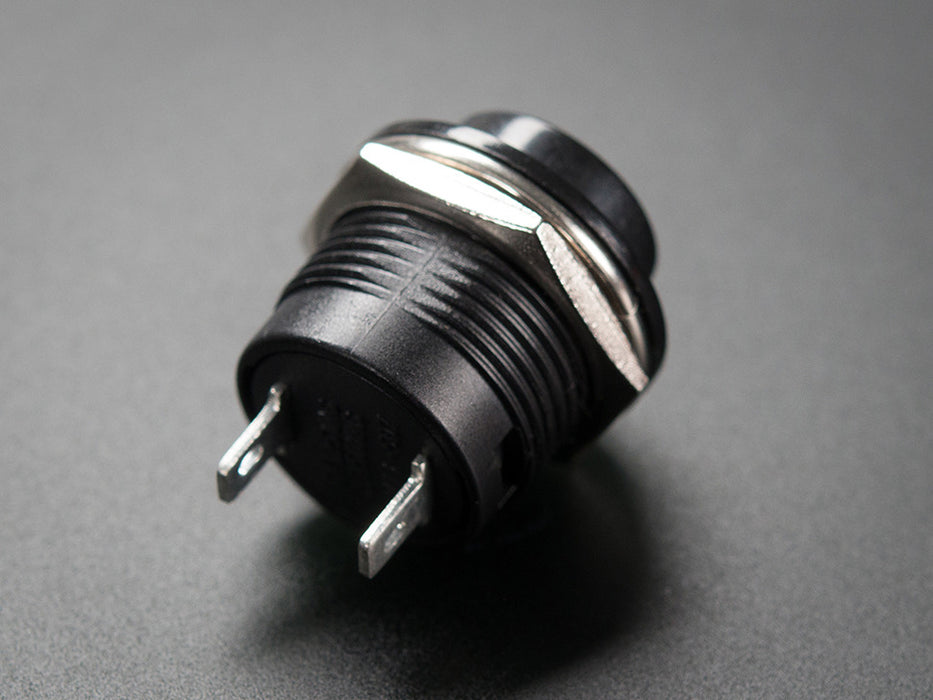 Angled shot of 16mm black panel mount pushbutton.