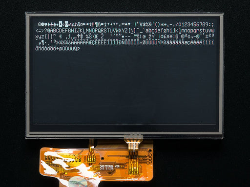 Overhead shot of TFT touchscreen driver board with header.