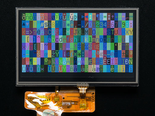 Overhead shot of TFT touchscreen driver board with header.