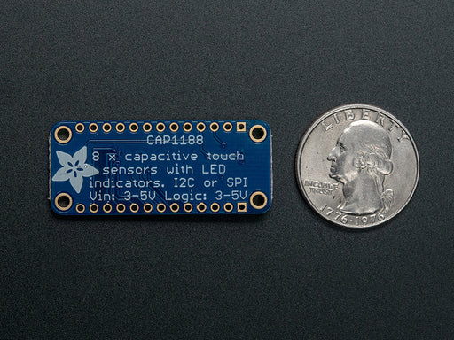 Capacitive Touch Sensor Breakout on breadboard with hand touching many attached wires