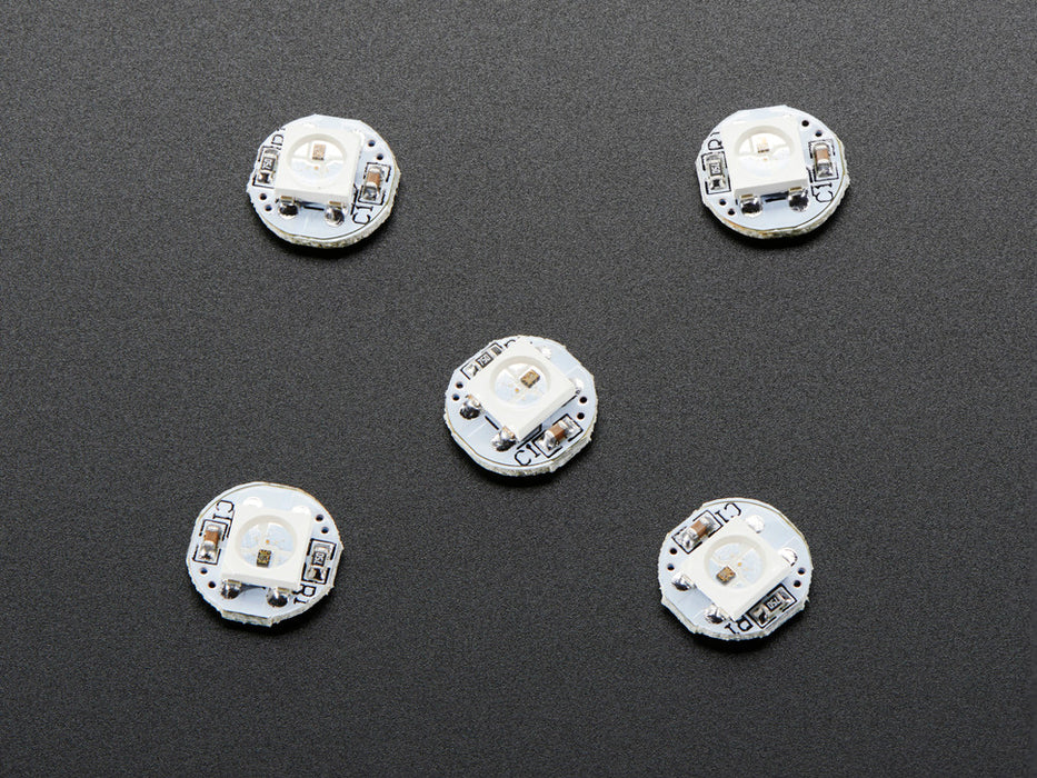 Glowing NeoPixel Mini Button PCB wired up to a microcontroller