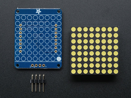 Assembled and powered on Small 1.2" 8x8 Ultra Bright White LED Matrix. A white graphical smiley is displayed.