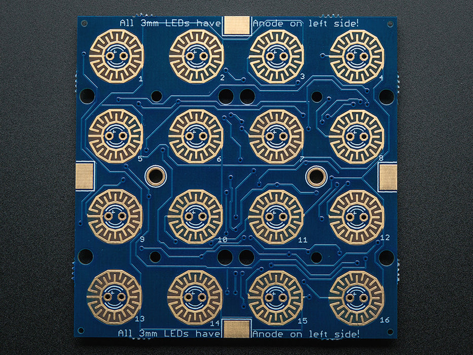 Finger pressing a button on lit up elastomer button pad