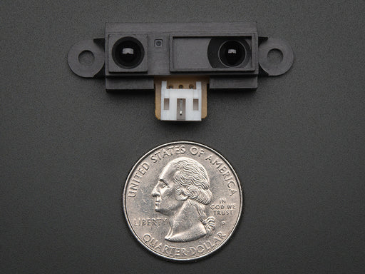 Top view of an IR distance sensor with cable.