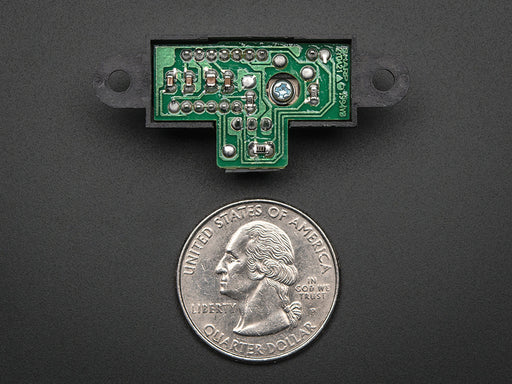 Top view of an IR distance sensor with cable.