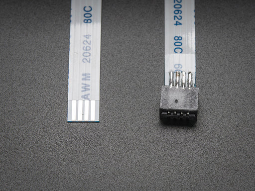 Resistive Touchscreen Extension Cable with 1mm Pitch next to quarter