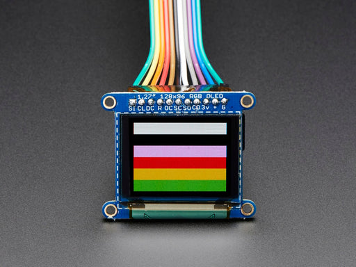 Overhead video of OLED breakout displaying triple axis numbers.