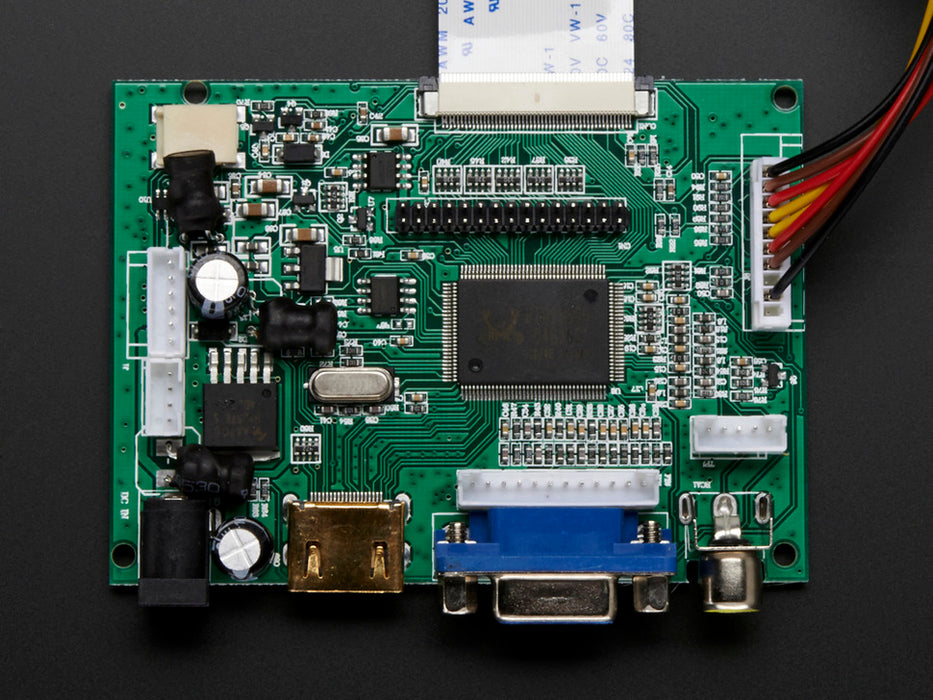 Angled shot of an assembled HDMI 4 Pi 5" Display not Touchscreen 800x480. The HDMI screen displays a desktop image including the Adafruit logo, the Raspberry Pi logo, and a pink heart.