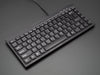 Mini Chiclet Keyboard - USB Wire. Black colored, in use