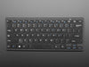 Angled shot Mini Wireless Keyboard - Black w/ Batteries