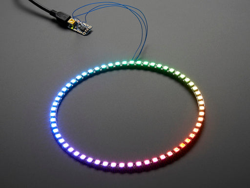 Hand holding NeoPixel Ring with 60   x 5050 RGB LED, lit up rainbow