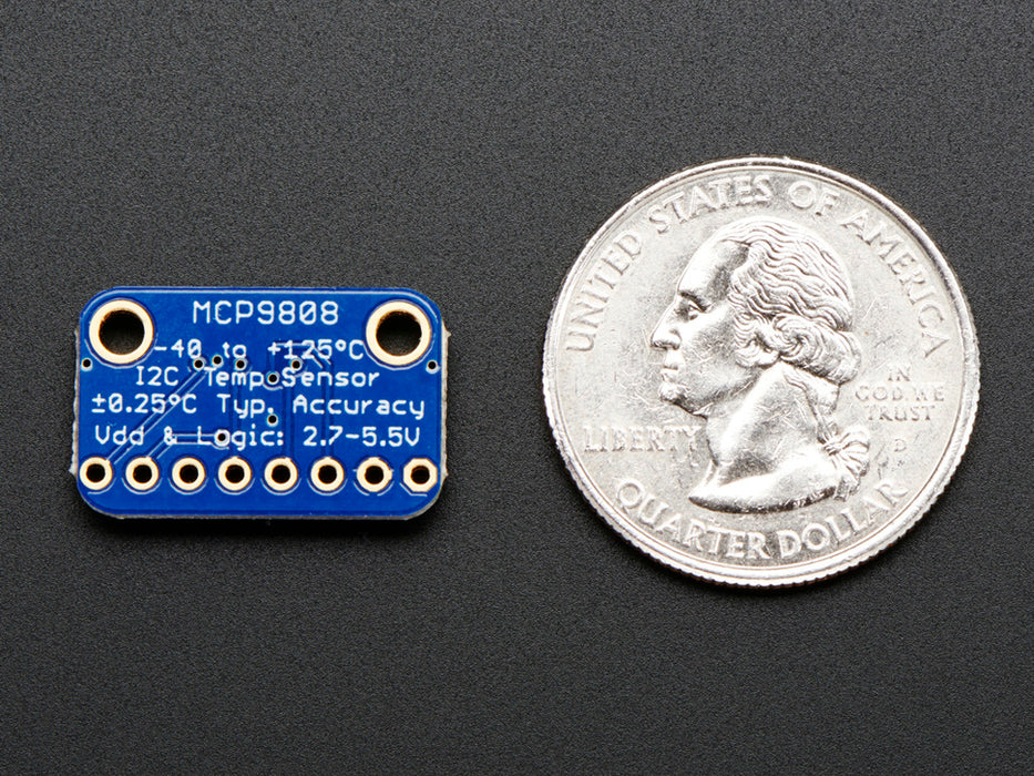 Angled shot of a small, blue, rectangular temperature sensor breakout board.