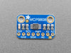 Angled shot of a small, blue, rectangular temperature sensor breakout board.