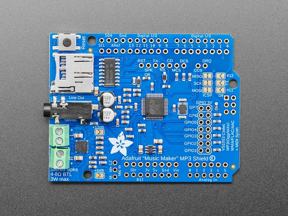 Adafruit "Music Maker" MP3 Shield for Arduino w/3W Stereo Amp connected to a set of speakers. 