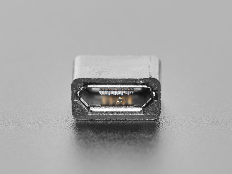 Angled shot of an assembled USB DIY Connector with MicroB Female Plug. The female pluf faces the camera angle. 