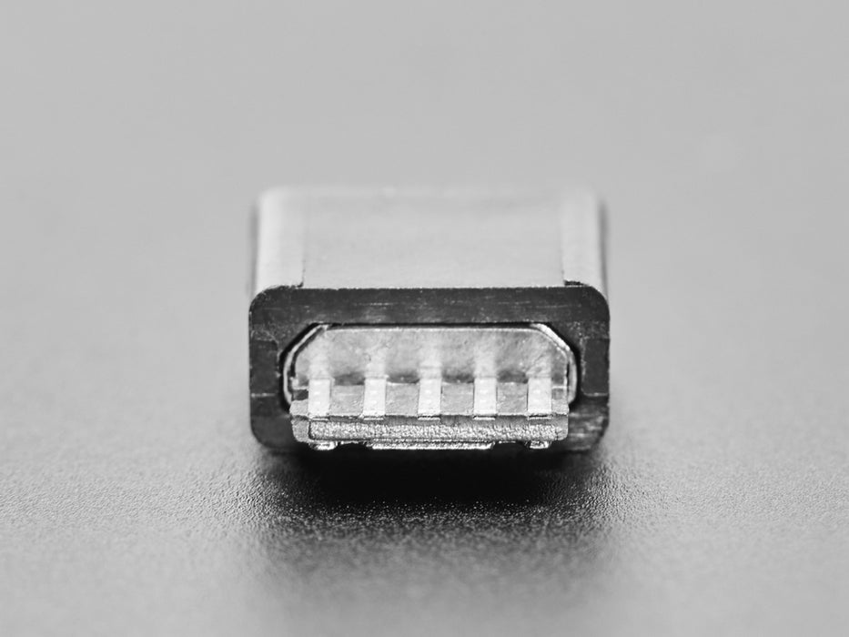 Angled shot of an assembled USB DIY Connector with MicroB Female Plug. The female pluf faces the camera angle. 