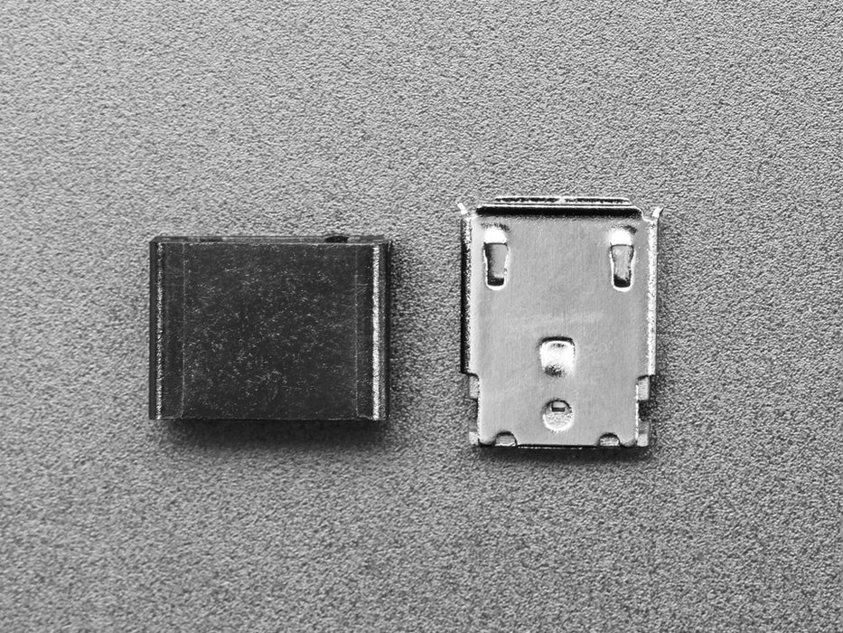 Angled shot of an assembled USB DIY Connector with MicroB Female Plug. The female pluf faces the camera angle. 