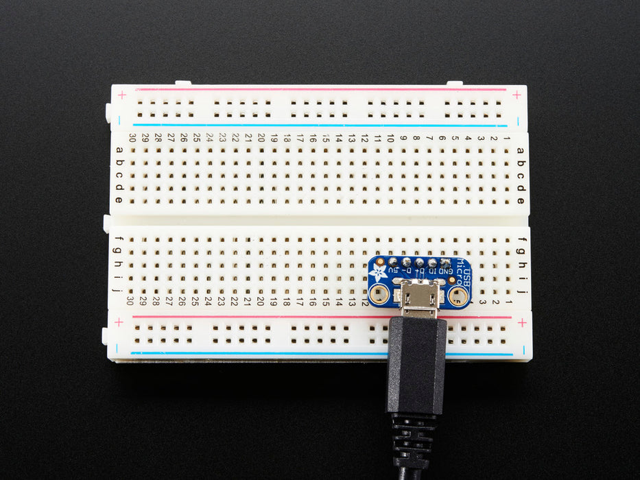 Angled shot of a USB Micro-B Breakout Board.