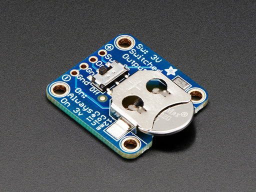 Angled shot of a 12mm Coin Cell Breakout Board with On-Off Switch.