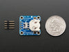 Angled shot of a 12mm Coin Cell Breakout Board with On-Off Switch.