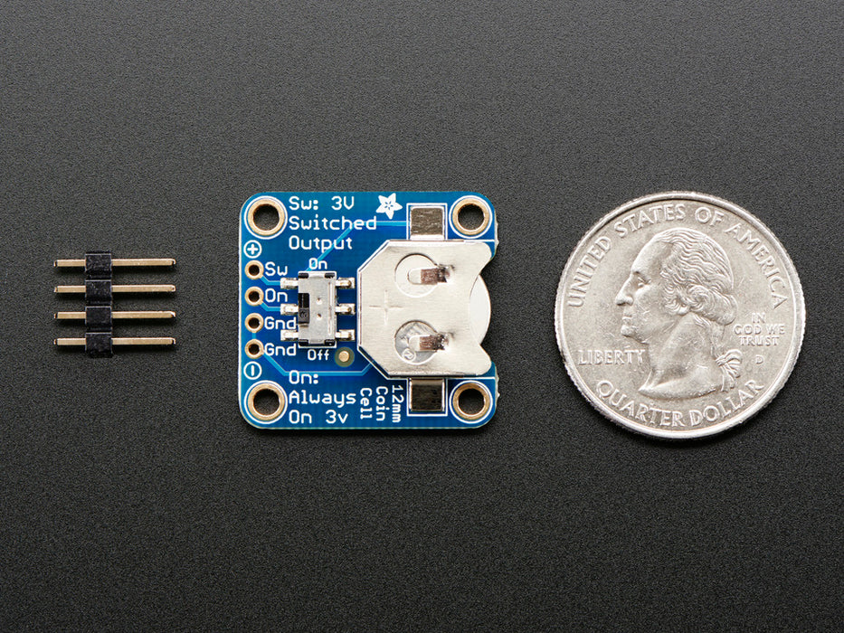 Angled shot of a 12mm Coin Cell Breakout Board with On-Off Switch.