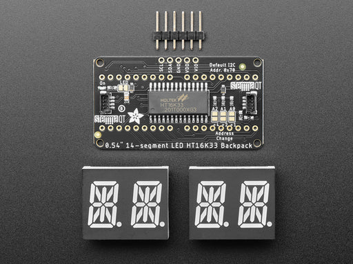 Overhead video of an assembled 14-segment LED backpack, emitting the follow text in blue LEDS: "AdaFruit 14-Segment Backpack"