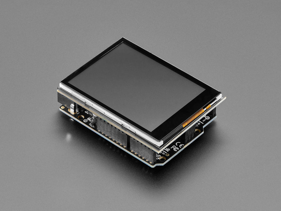 White hand holding a 2.8" TFT Touch Shield for Arduino w/Capacitive Touch while drawing a swiggling line and a star on the display. 