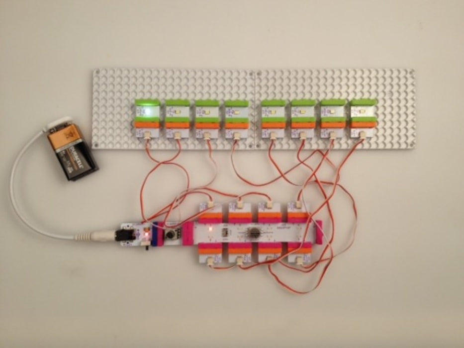 Close up of top of rectangular PCB with pink connectors