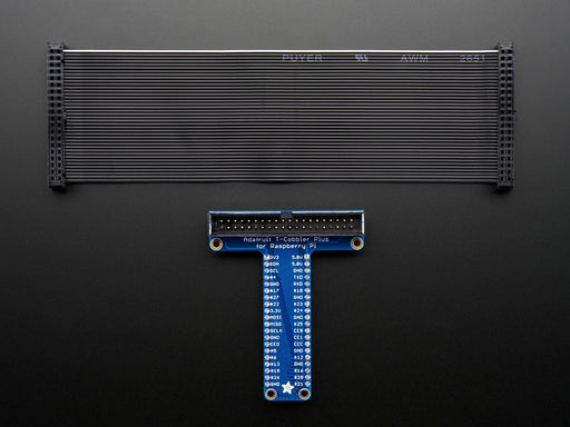 Angled shot of Assembled Pi T-Cobbler Plus next to GPIO ribbon cable