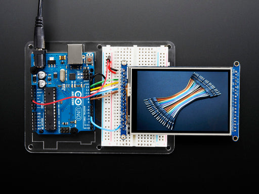 TFT breakout wired to arduino, hand drawing a cursive hello using touchscreen