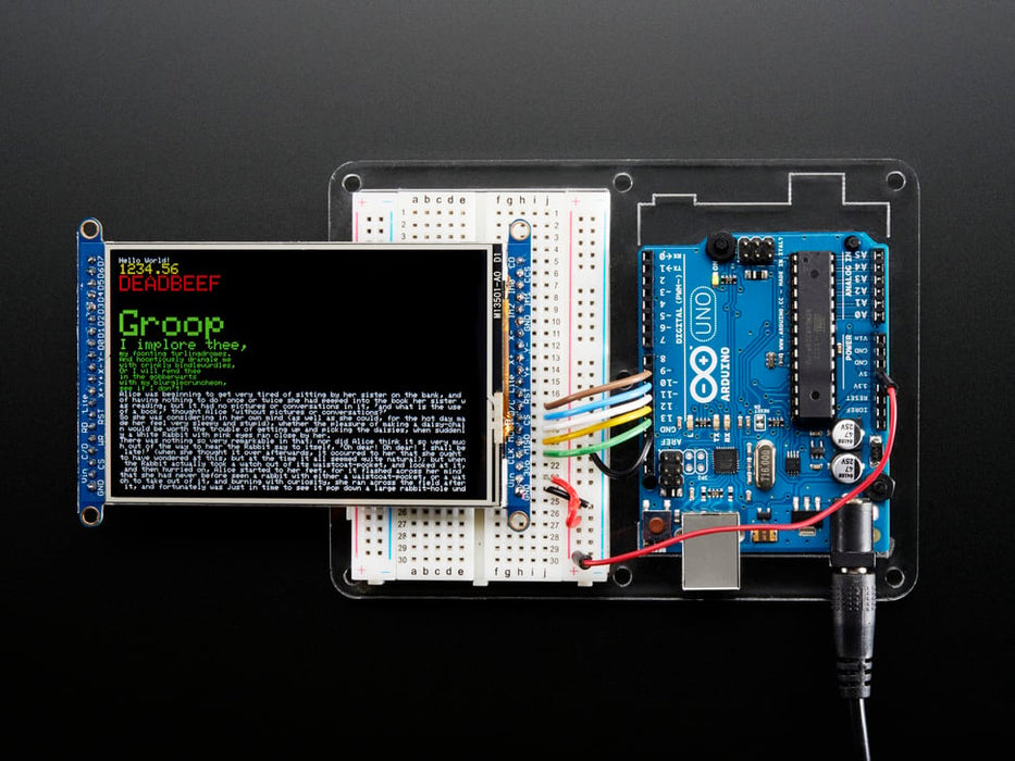 TFT breakout wired to arduino, hand drawing a cursive hello using touchscreen