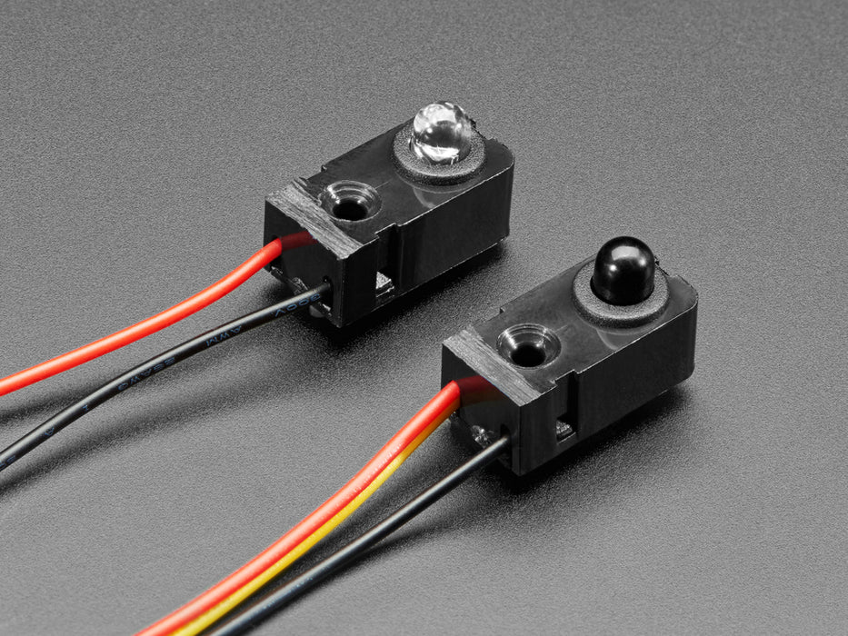 Two wired modules with LEDs and mounting holes