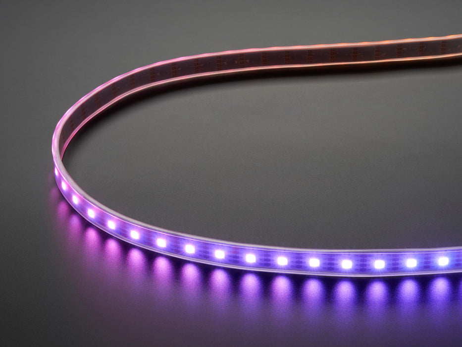 Video of part of a coiled LED strip glowing various colors in succession.