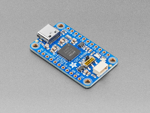 Angled shot of a Adafruit FT232H Breakout - General Purpose USB to GPIO, SPI, I2C - USB C & Stemma QT. 