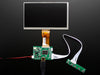 Front shot of a HDMI 4 Pi: 7" Display. The monitor displays a desktop background with a adafruit logo, raspberry logo, and a heart. 