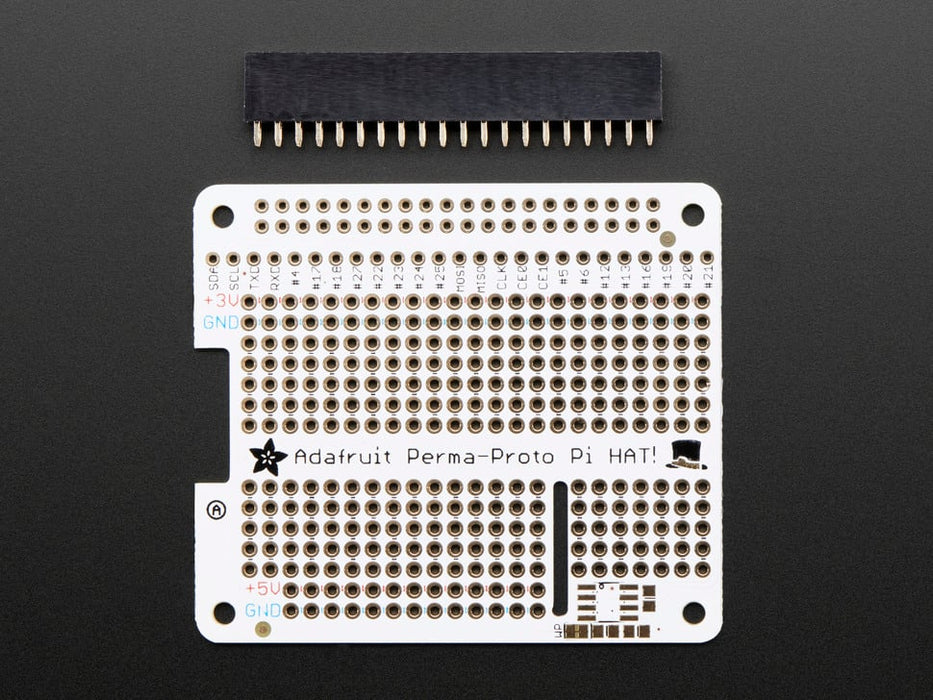 Angled shot of Adafruit Perma-Proto HAT for Pi Mini Kit on a Raspberry Pi.