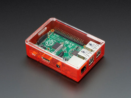 Assembled red acrylic Raspberry Pi case with no lid.