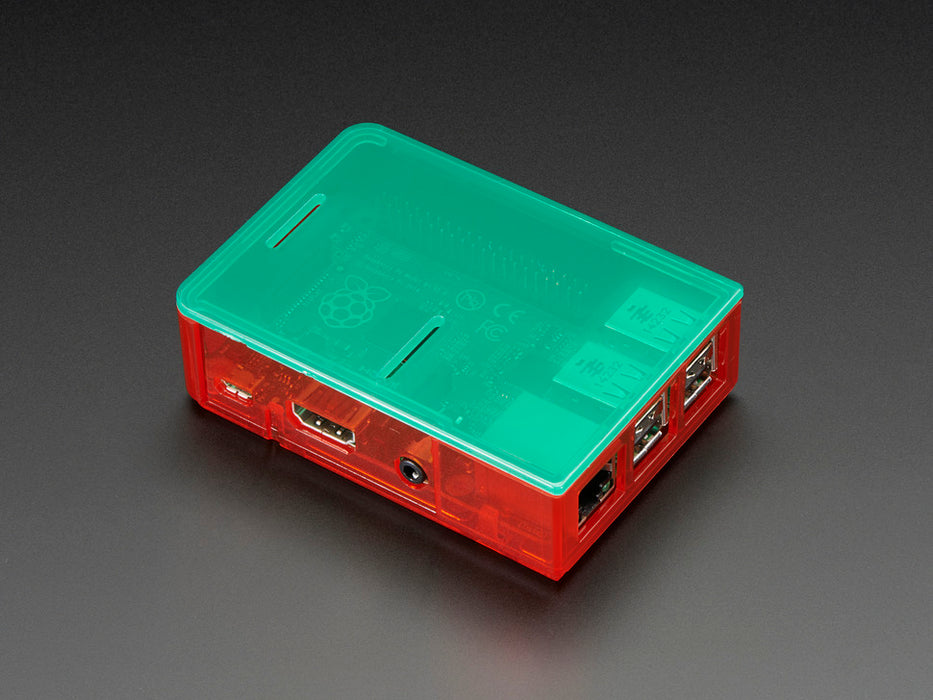 Assembled red acrylic Raspberry Pi case with no lid.