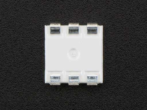 Top down view of a 5050 Warm White LED w/ Integrated Driver Chip. 