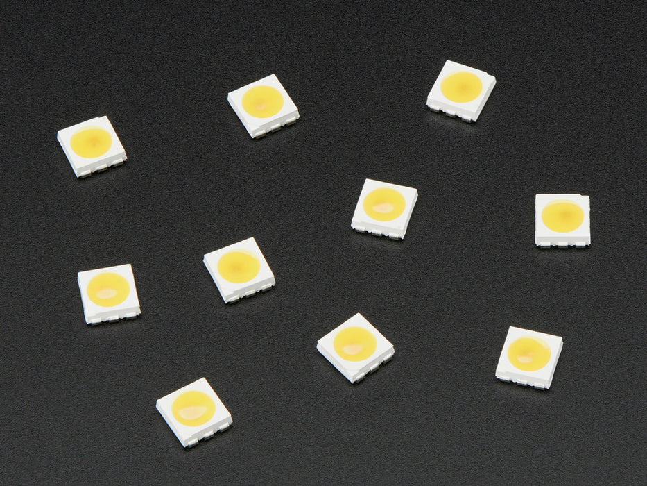 Top down view of a 5050 Warm White LED w/ Integrated Driver Chip. 
