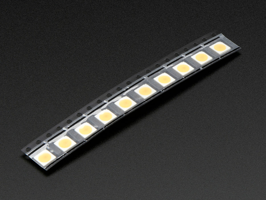 Top down view of a 5050 Warm White LED w/ Integrated Driver Chip. 