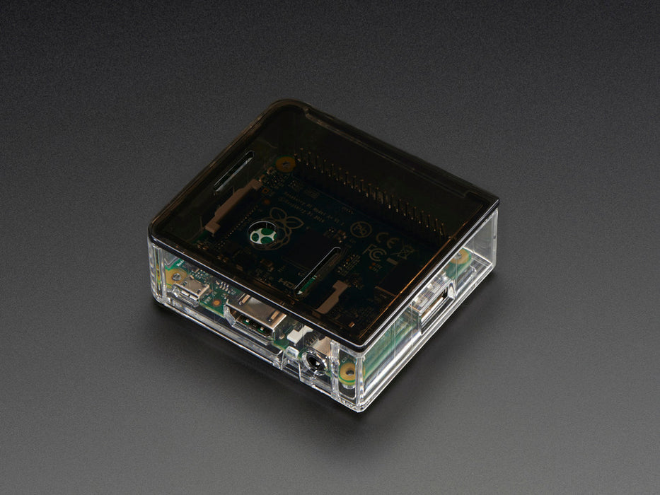 Angled shot of clear Raspberry Pi Model A+ Case without a lid.