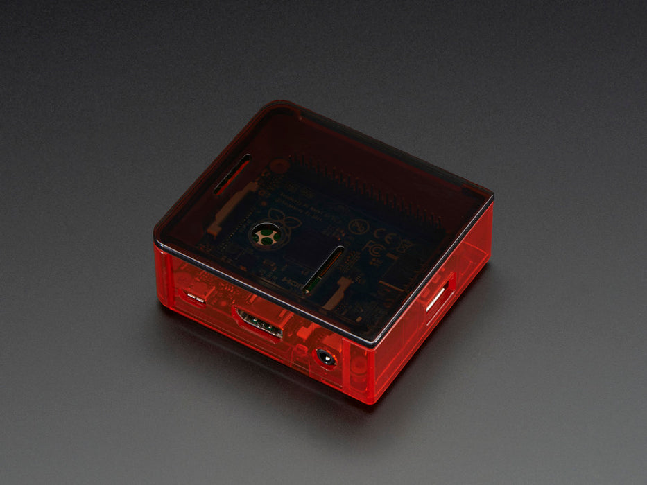 Angled shot of red Raspberry Pi Model A+ Case without lid.