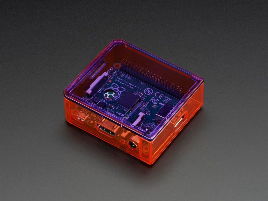 Angled shot of orange Raspberry Pi Model A+ Case without lid.