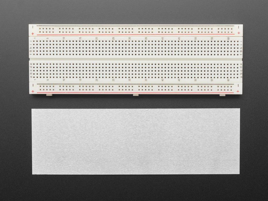 Angled shot of full sized breadboard.