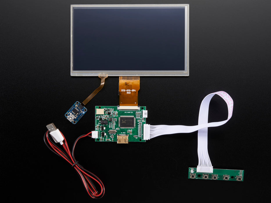 Front shot of a HDMI 4 Pi: 7" Display connected to a Raspberry Pi. The monitor displays a desktop background with a adafruit logo, raspberry logo, and a heart. 