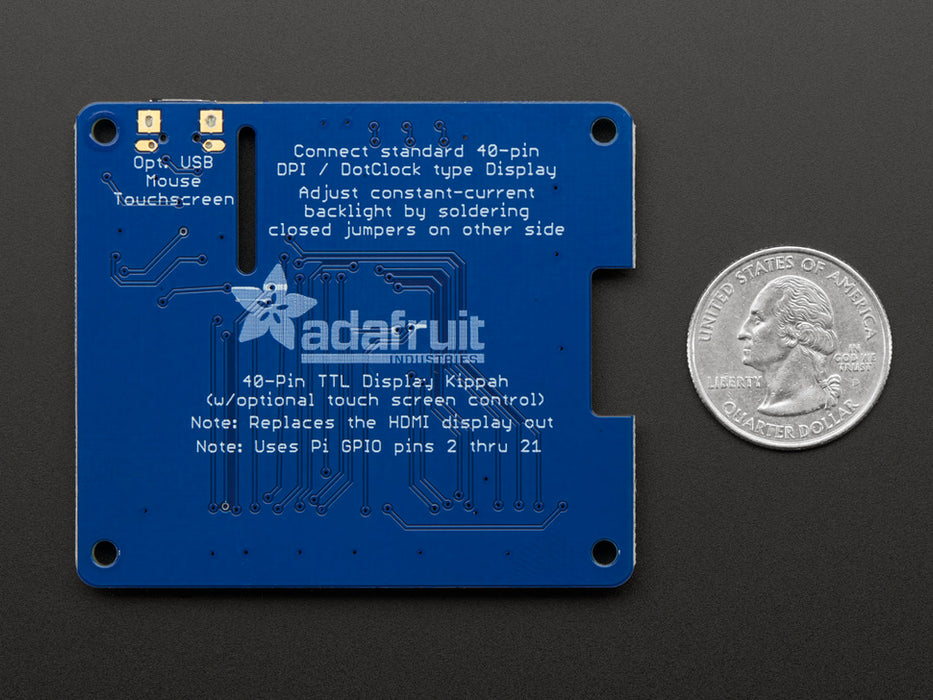 Front view of a white hand touching Adafruit DPI TFT Kippah for Raspberry Pi with Touch Support that connected to a Raspberry Pi