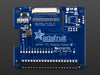 Adafruit DPI TFT Kippah for Raspberry Pi connected to a Pi and display.