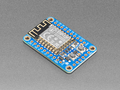 Angled shot of a Adafruit HUZZAH ESP8266 Breakout. 